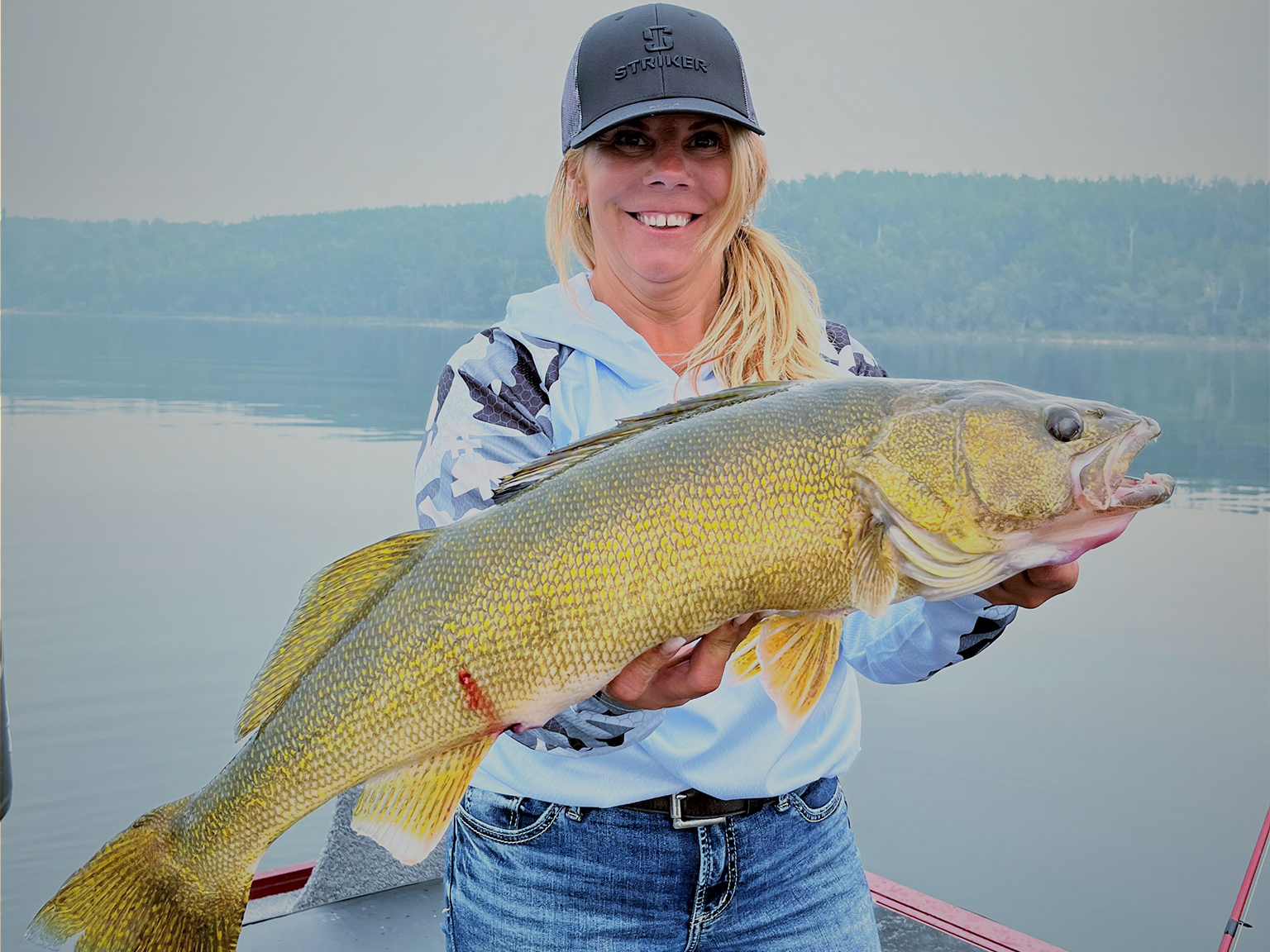 Lisa Roper - Another great morning in the water, trolling for walleye with  Jessica from Len Thompson Fishing Lures Congrats Jess on this beauty  what a gurthy walleye. ~ Caught on a